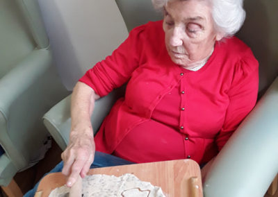 Abbotsleigh Care Home resident cutting out salt dough shapes