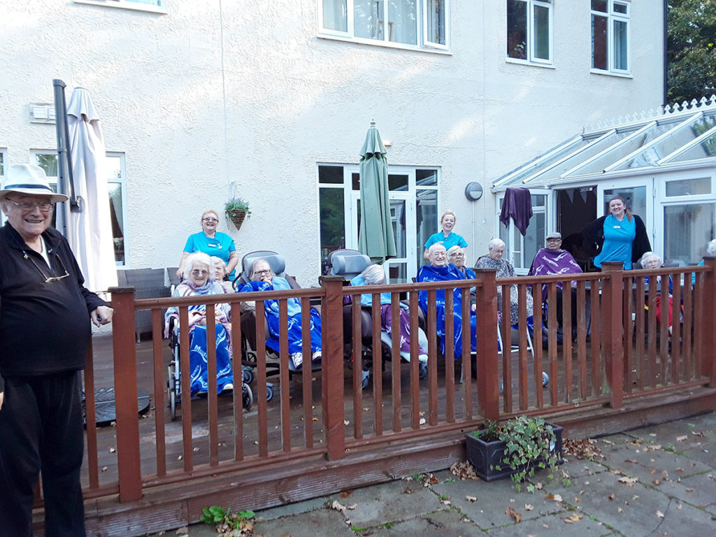Residents enjoy tea on the terrace at Abbotsleigh Care Home