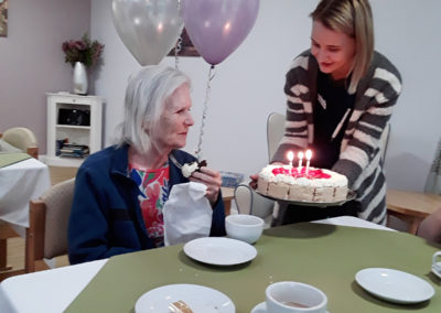 Abbotsleigh Care Home resident receiving her birthday cake