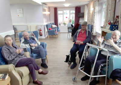 Residents at Abbotsleigh Care Home enjoying some live ukulele music