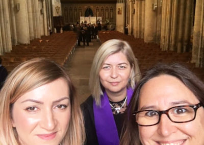 Staff from Abbotsleigh Care Home with their Manager inside Staff from Abbotsleigh Care Home inside Rochester cathedral with their Manager for a graduation ceremony