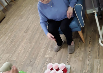 Resident playing cup and ball game at Abbotsleigh