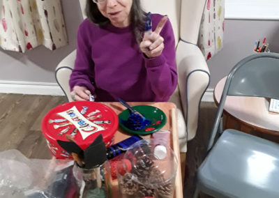 Resident doing Christmas crafts at Abbotsleigh Care Home