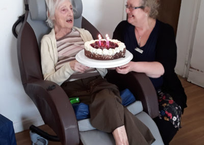 Resident with her birthday cake at Abbotsleigh