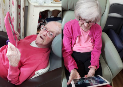 Residents with iPads, connecting with family through Skype