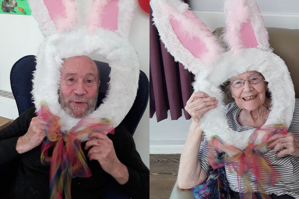 Abbotsleigh Care Home residents posing with a funny fluffy bunny face frame