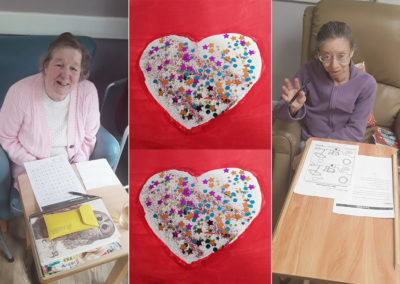 Residents with a glittery heart they have made to display at Abbotsleigh