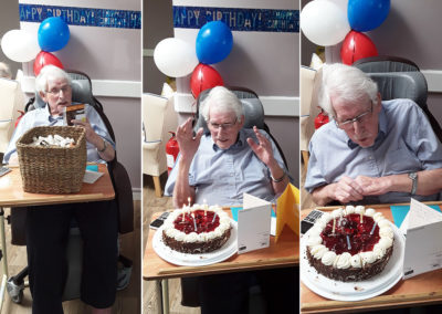 Resident receiving his birthday cake at Abbotswleigh Care Home
