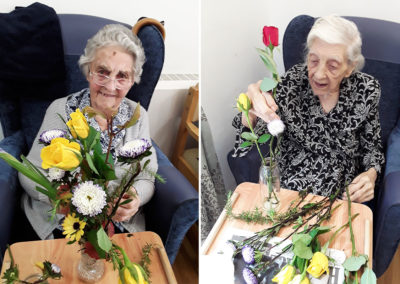 Abbotsleigh Care Home lady residents arranging flowers
