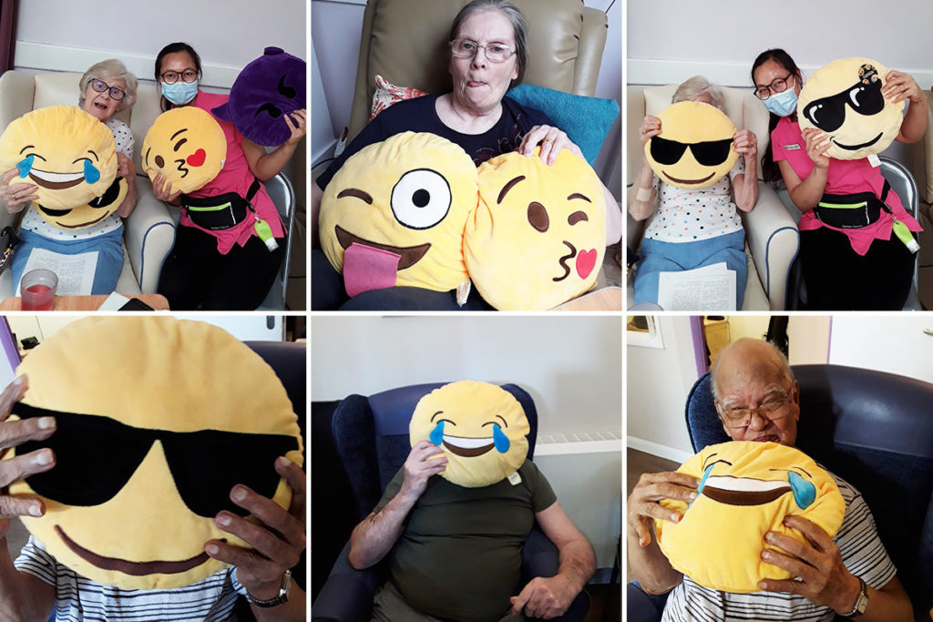 Abbotsleigh Care Home residents and staff taking emoji selfies together