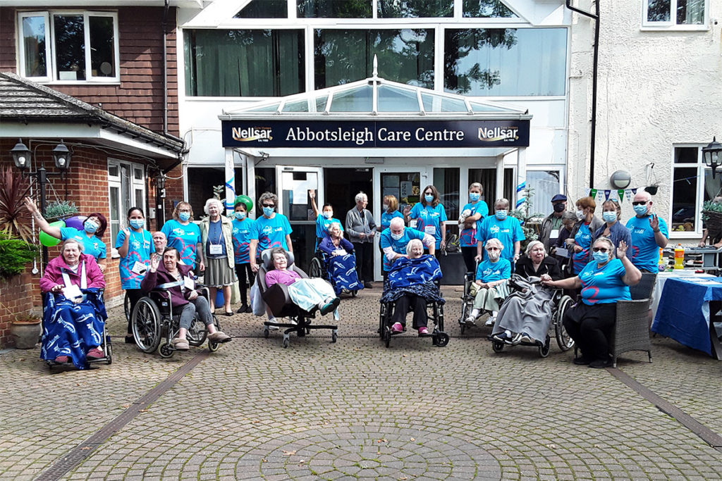 Staff, residents and families outside Abbotsleigh Care Home ready for an Alzheimer's memory walk