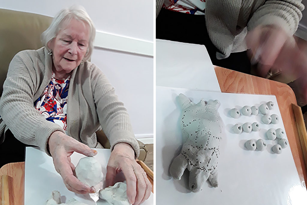 Resident at Abbotsleigh Care Home working with clay