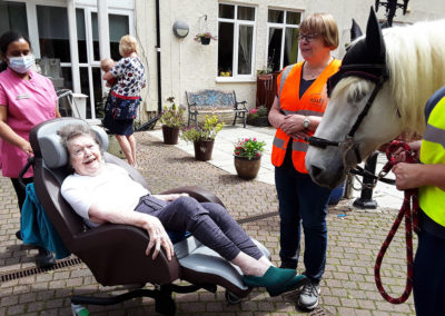 Resident with a RDA horse at Abbotsleigh Care Home