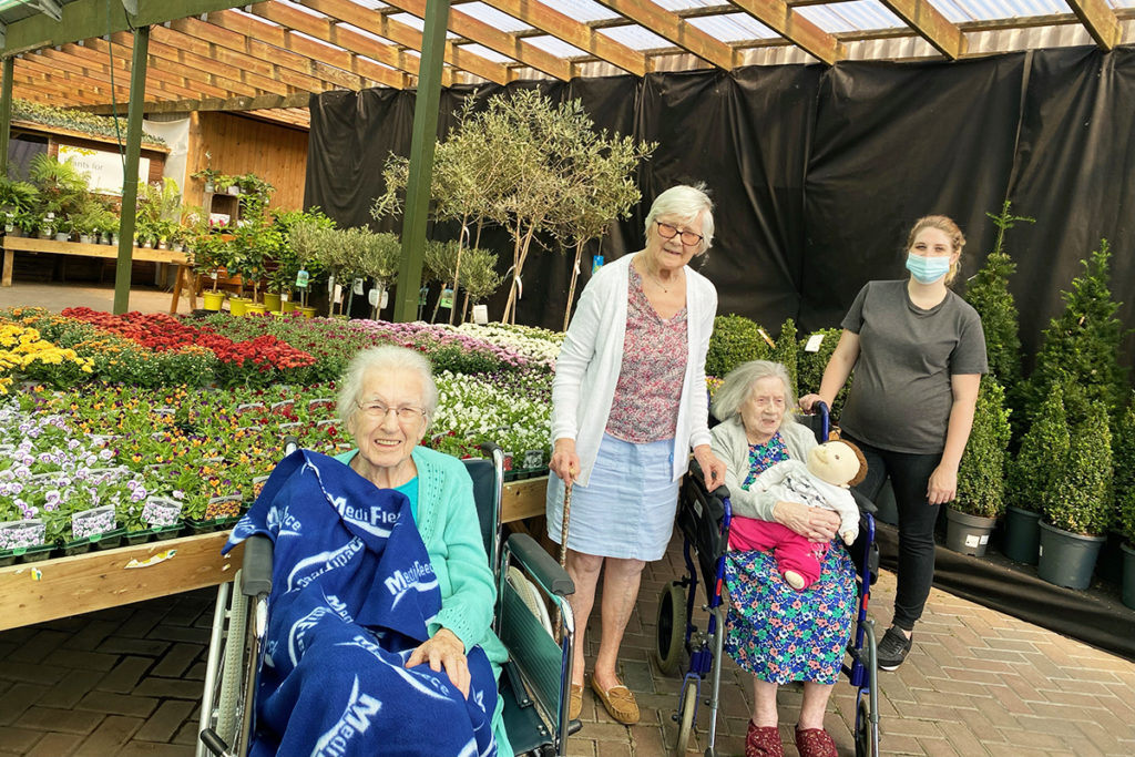Abbotsleigh Care Home residents enjoying a Garden Centre visit